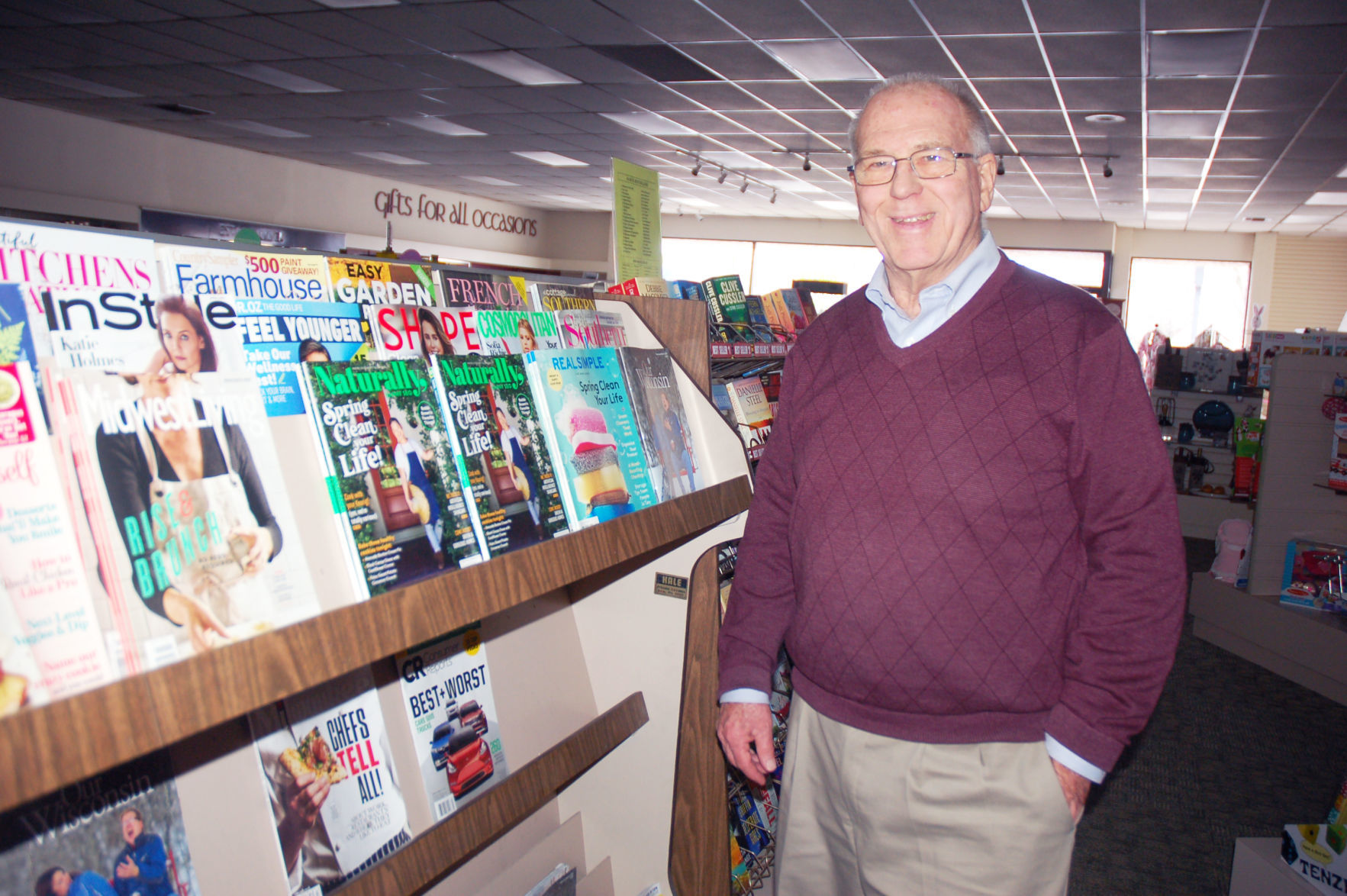 Jim McCullough drug store owner Walworth inside his store